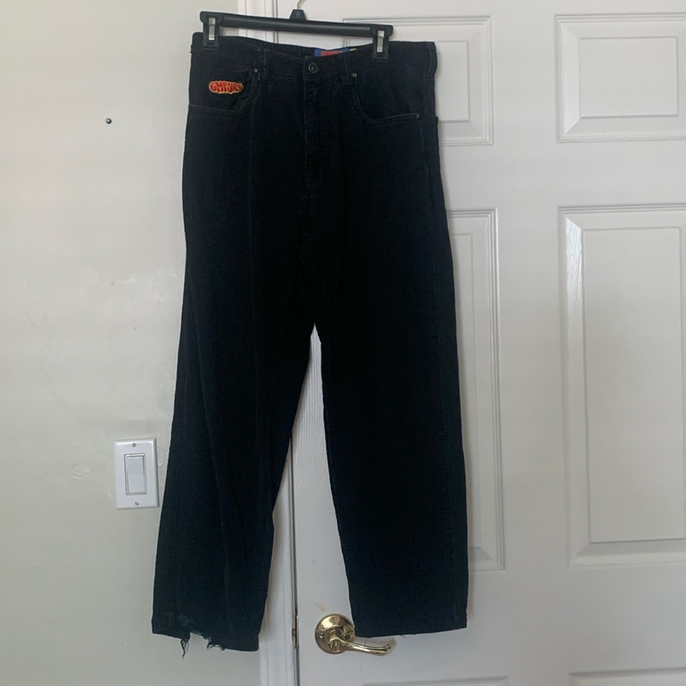 2 Loose Fit Corduroy Skate Pants. One all black and the other all brown.